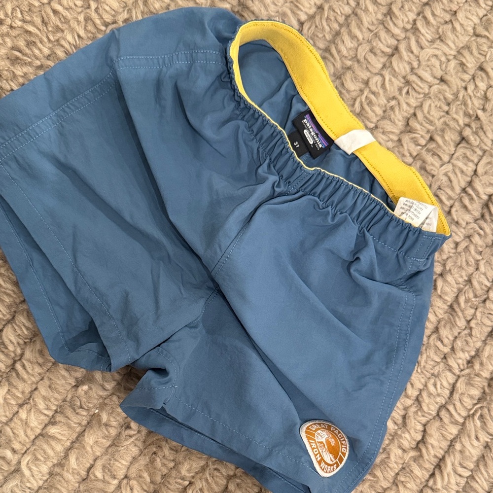 Patagonia Kids Swim Trunks in Blue with Yellow Waistband